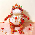 Ruby Jewel Toad – Handcrafted Red Crochet Figurine with Gold Crown, Layered Gem Necklace &amp; Ruby Brooch | The Third Space