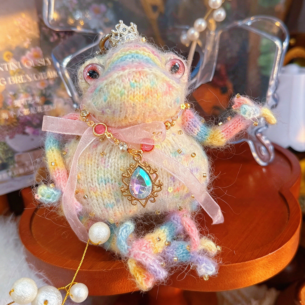 Rainbow Charm Toad – Hand-Knitted Bag Charm with Silver Crystal Crown, Ruby Necklace, Pink Tulle Bow &amp; Pearl Tassel | The Third Space