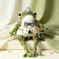 Victorian Duke Toad – Hand-Knitted Luxe Vintage Figurine with Silver Crown, Emerald Square Gem, Tartan Bow, Layered Green Necklaces &amp; Beetle Brooch | The Third Space