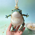 Knitted Pearl Toad – Hand-Knitted Figurine with Gold Crown, Pearl &amp; Crystal Accents, Layered Chain Tassels &amp; Pearl Hanger | The Third Space