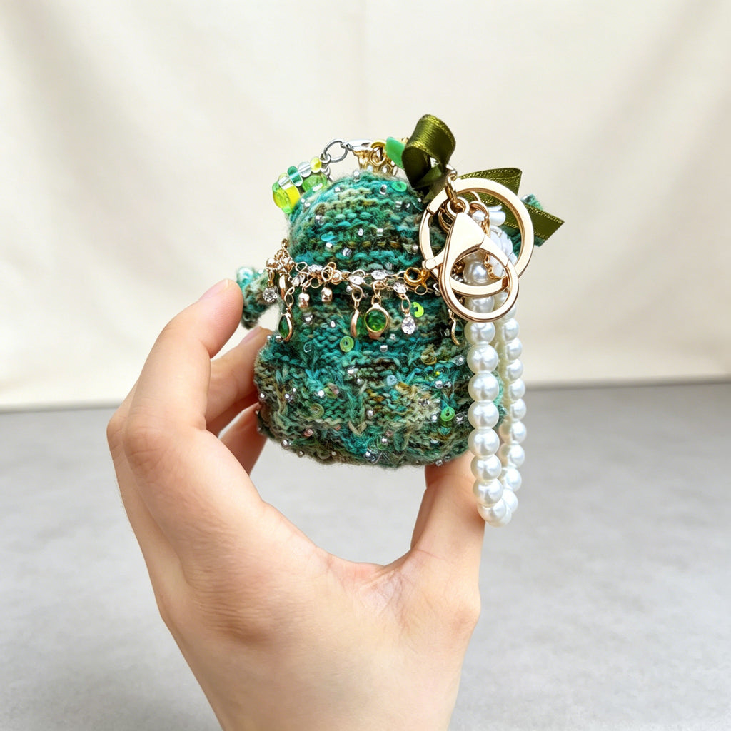 Emerald Prince Toad – Hand-Knitted Vintage Green Bag Charm with Gold Crown, Olive Bow, Layered Crystal Necklace, Red Rose Pendant &amp; Pearl Chain | The Third Space