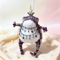 Dark Fortune Toad Queen – Hand-Knitted Gothic Lolita Figurine with Black Crystal Crown, Silver Chain Pendants, Coin-Back Embroidery &amp; Sequin Details | The Third Space