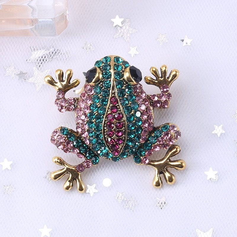 The Toad Who Inherited a Jewel Box – Hand-Knitted Royal Toad in Pink-Purple Gold-Thread Yarn with Gold Crown, Ruby Heart Pendants, Diamond Teardrop Chains, Vintage Frog Brooch &amp; Crystal Ladybug | The Third Space