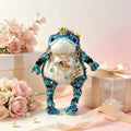 The Baker of Sweets – Hand-Knitted Royal Toad with Gold Crown, Blue Glass Eyes, Dessert Pendant Necklace (Croissant, Donut, Macaron, Cupcake, Baguette) &amp; Sequin-Studded Blue Gradient Body | The Third Space