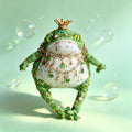 The Enchanted Emerald Toad – Hand-Knitted Royal Figurine with Gold Crown, Layered Emerald &amp; Crystal Necklaces, Sequin-Studded Green Limbs &amp; Glossy Green Glass Eyes | The Third Space