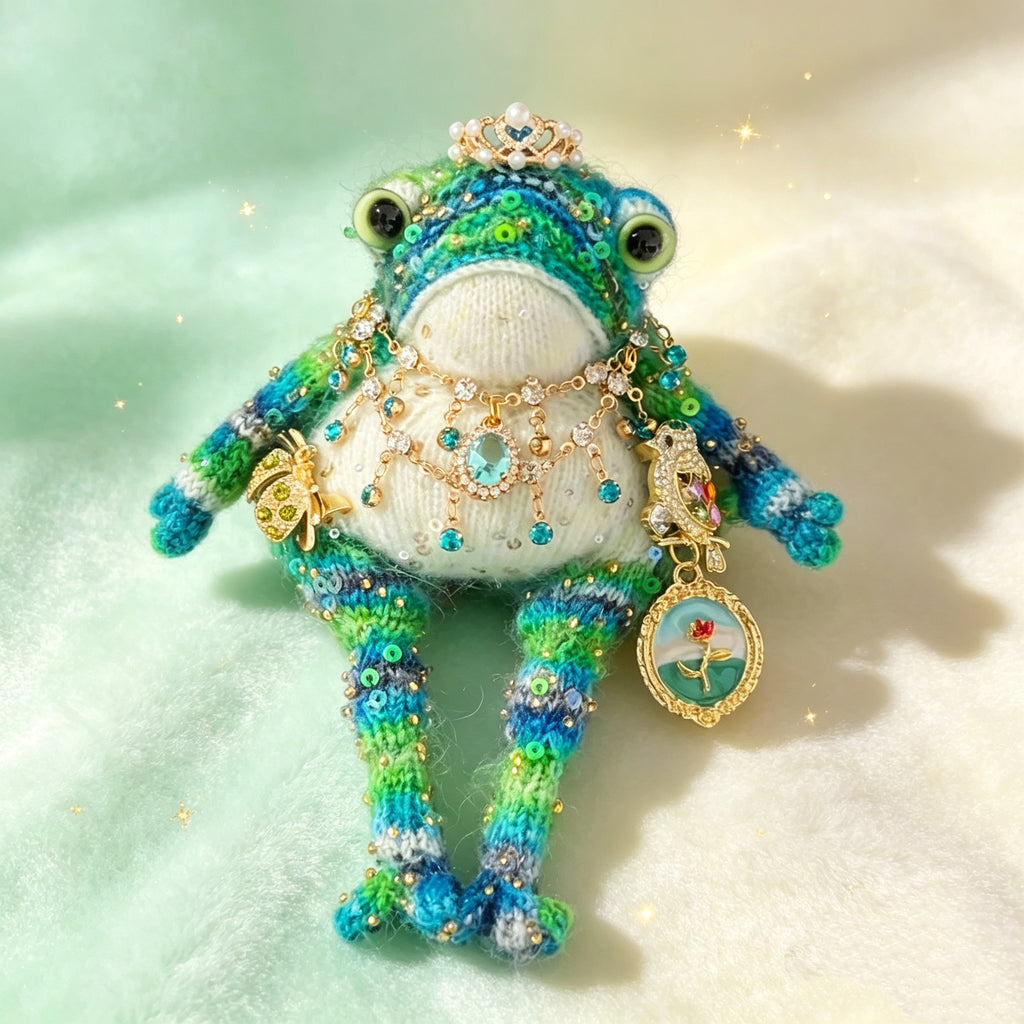 The Sea-Gifted Toad – Hand-Knitted Ocean Fairy Figurine with Crown, Gold Ladybug, Jeweled Bird, Teardrop Ocean Gem, Rose-and-Sea Locket &amp; Sequin-Scaled Limbs | The Third Space