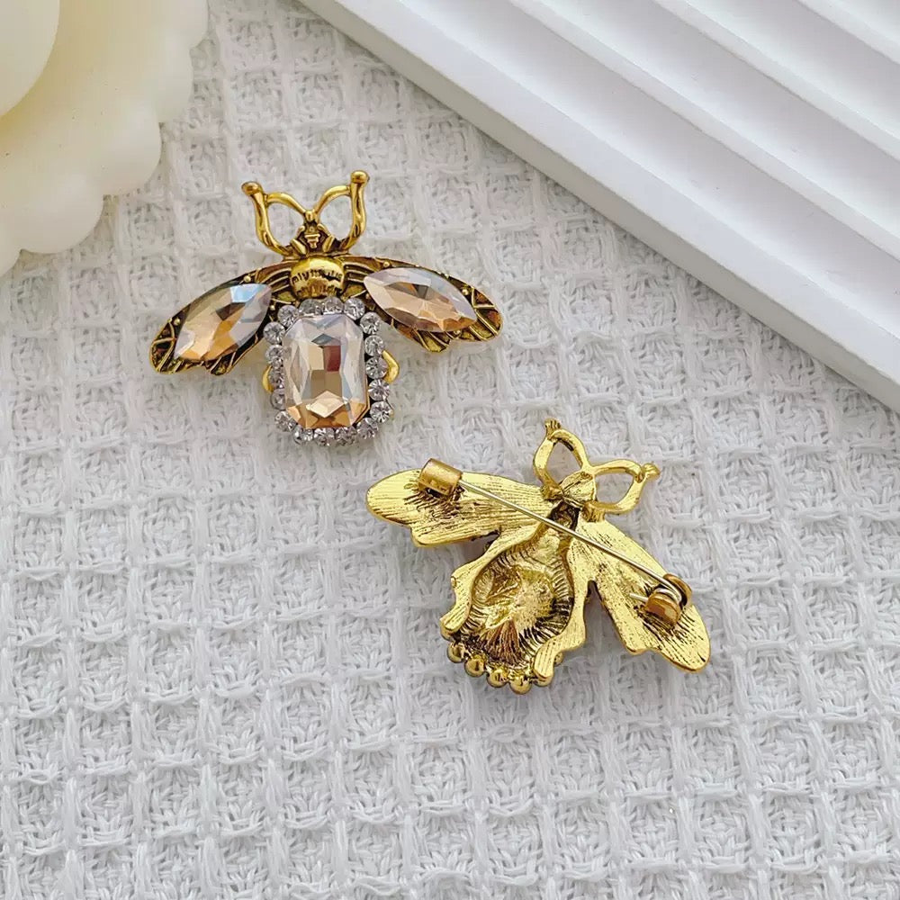 Cosmic Bee Saturn Toad – Handknit Cream &amp; Gold Figurine with Crystal-Winged Bee, Planetary Pendant &amp; Sequin Stardust