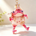 The Fairy Toad Who Carries Love – Hand-Knitted Pink Princess Bag Charm with Pearl Crown, Crystal Necklace, Sequin Limbs &amp; "Love" Tag | The Third Space