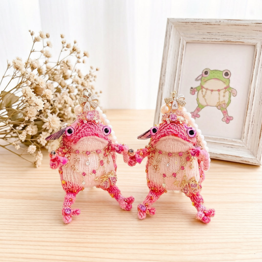 The Fairy Toad Who Carries Love – Hand-Knitted Pink Princess Bag Charm with Pearl Crown, Crystal Necklace, Sequin Limbs &amp; "Love" Tag | The Third Space