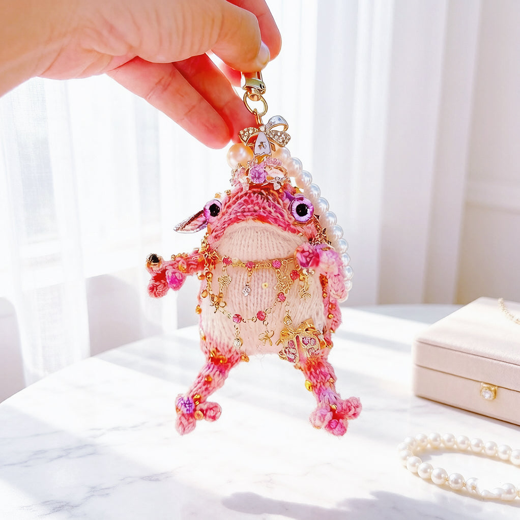 The Fairy Toad Who Carries Love – Hand-Knitted Pink Princess Bag Charm with Pearl Crown, Crystal Necklace, Sequin Limbs &amp; "Love" Tag | The Third Space