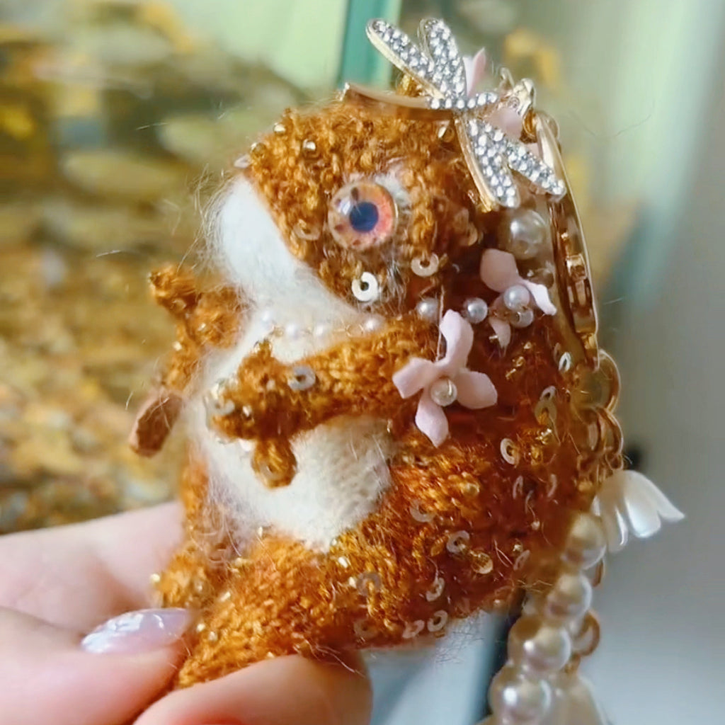 The Mini Toad Who Carries a Fairy Tale – Hand-Micro-Crochet Golden Charm with Blue-Violet Jewel Eyes, Crystal Crown, Pink Flowers, Pearl Chains &amp; Crystal Dragonfly | The Third Space