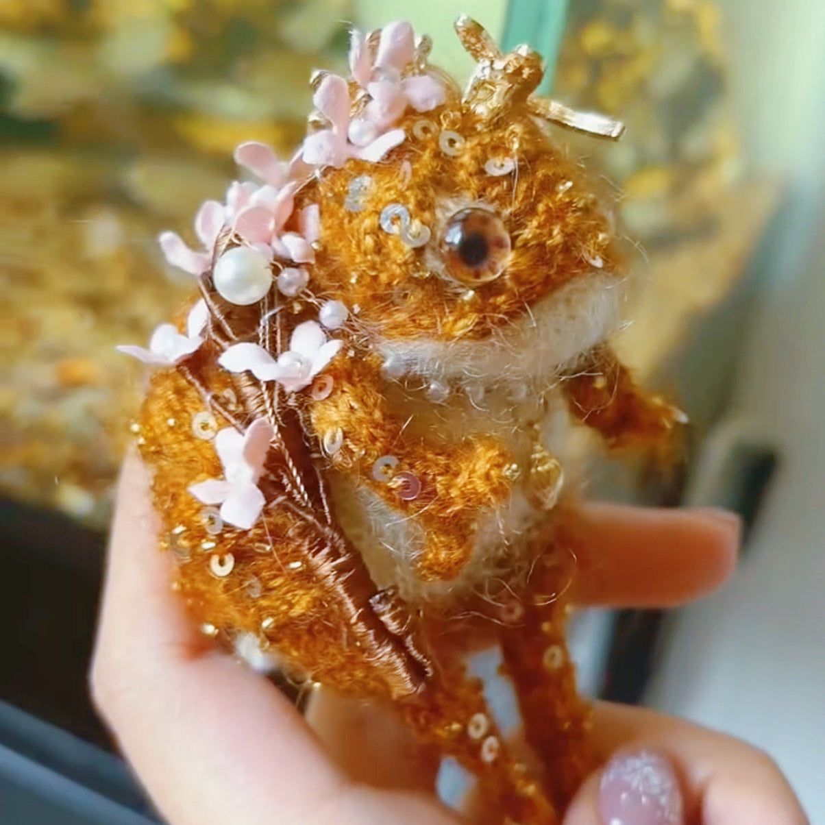 The Mini Toad Who Carries a Fairy Tale – Hand-Micro-Crochet Golden Charm with Blue-Violet Jewel Eyes, Crystal Crown, Pink Flowers, Pearl Chains &amp; Crystal Dragonfly | The Third Space