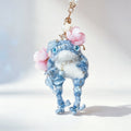 The Flower-Crowned Forest Prince – Hand-Knitted Miniature Toad Charm with Gold Crown, Blue Glass Eyes, Pink Blossoms, Pearl Necklace &amp; Sequin-Toed Limbs | The Third Space