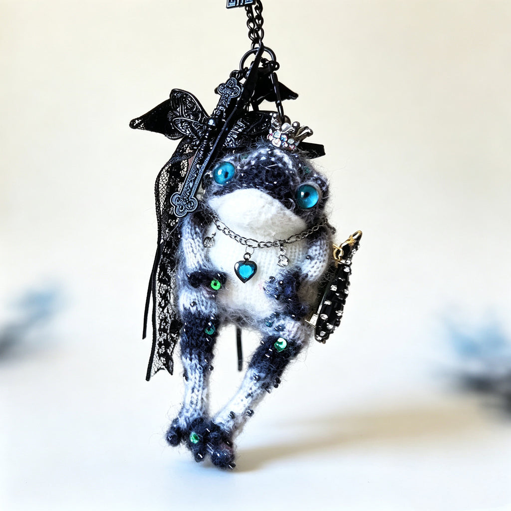 The Tiny Tyrant Who Rules the Midnight Court – Hand-Knitted Gothic Toad Charm with Crystal Crown, Sapphire Heart Necklace, Lace Bow, Tulle Cape &amp; Bejeweled Scepter | The Third Space