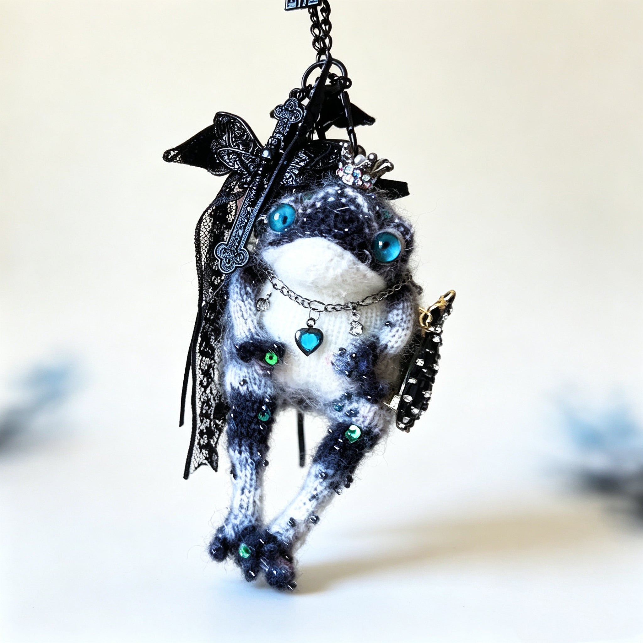 The Tiny Tyrant Who Rules the Midnight Court – Hand-Knitted Gothic Toad Charm with Crystal Crown, Sapphire Heart Necklace, Lace Bow, Tulle Cape &amp; Bejeweled Scepter | The Third Space