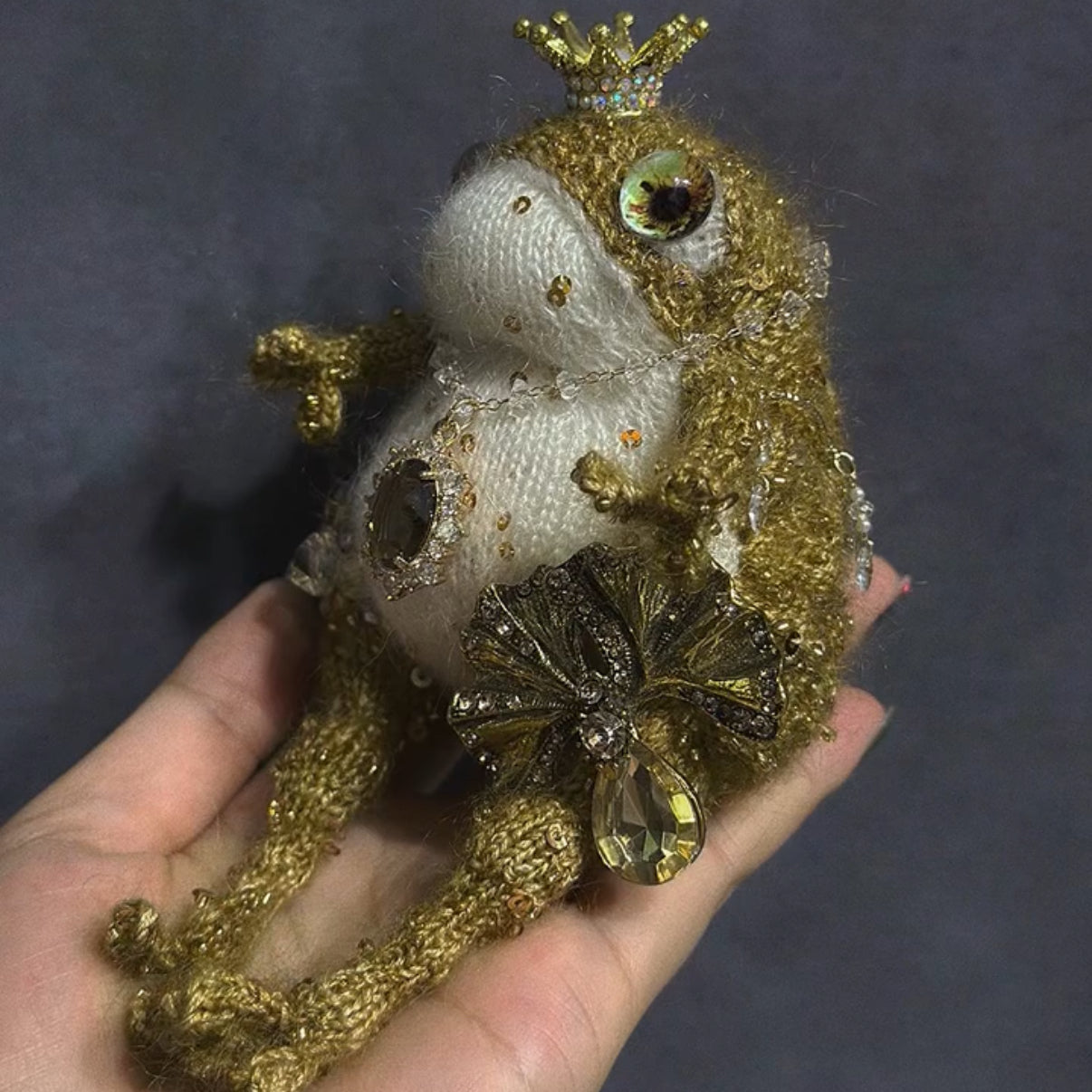 The Golden Frog Prince – Hand-Knitted Royal Charm with Mini Crown, Jewel Eyes, Gemstone Belly, Golden Limbs, Bow Accent &amp; Hanging Loop | The Third Space