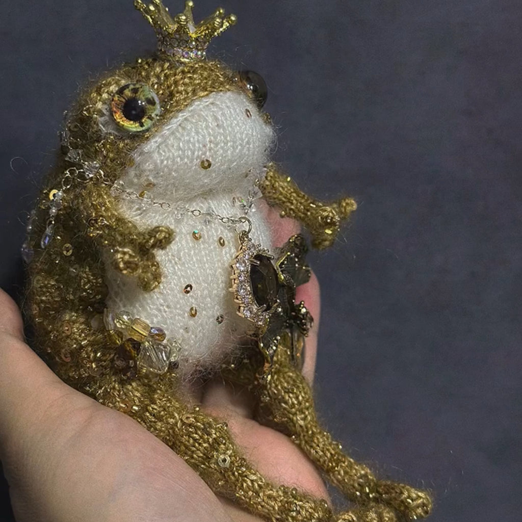 The Golden Frog Prince – Hand-Knitted Royal Charm with Mini Crown, Jewel Eyes, Gemstone Belly, Golden Limbs, Bow Accent &amp; Hanging Loop | The Third Space