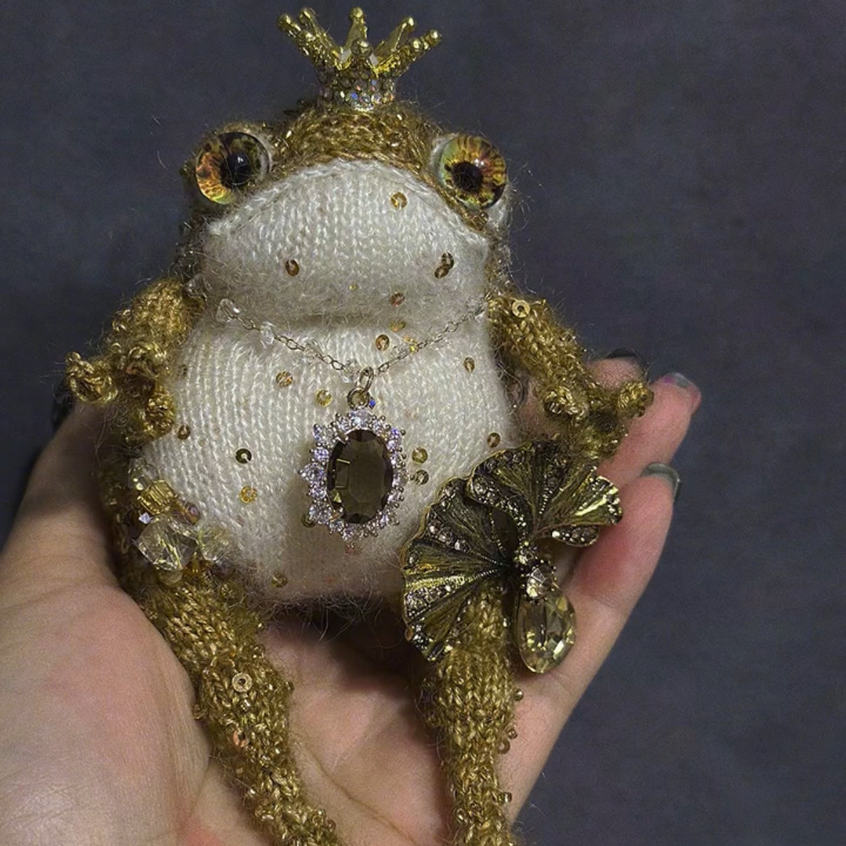 The Golden Frog Prince – Hand-Knitted Royal Charm with Mini Crown, Jewel Eyes, Gemstone Belly, Golden Limbs, Bow Accent &amp; Hanging Loop | The Third Space