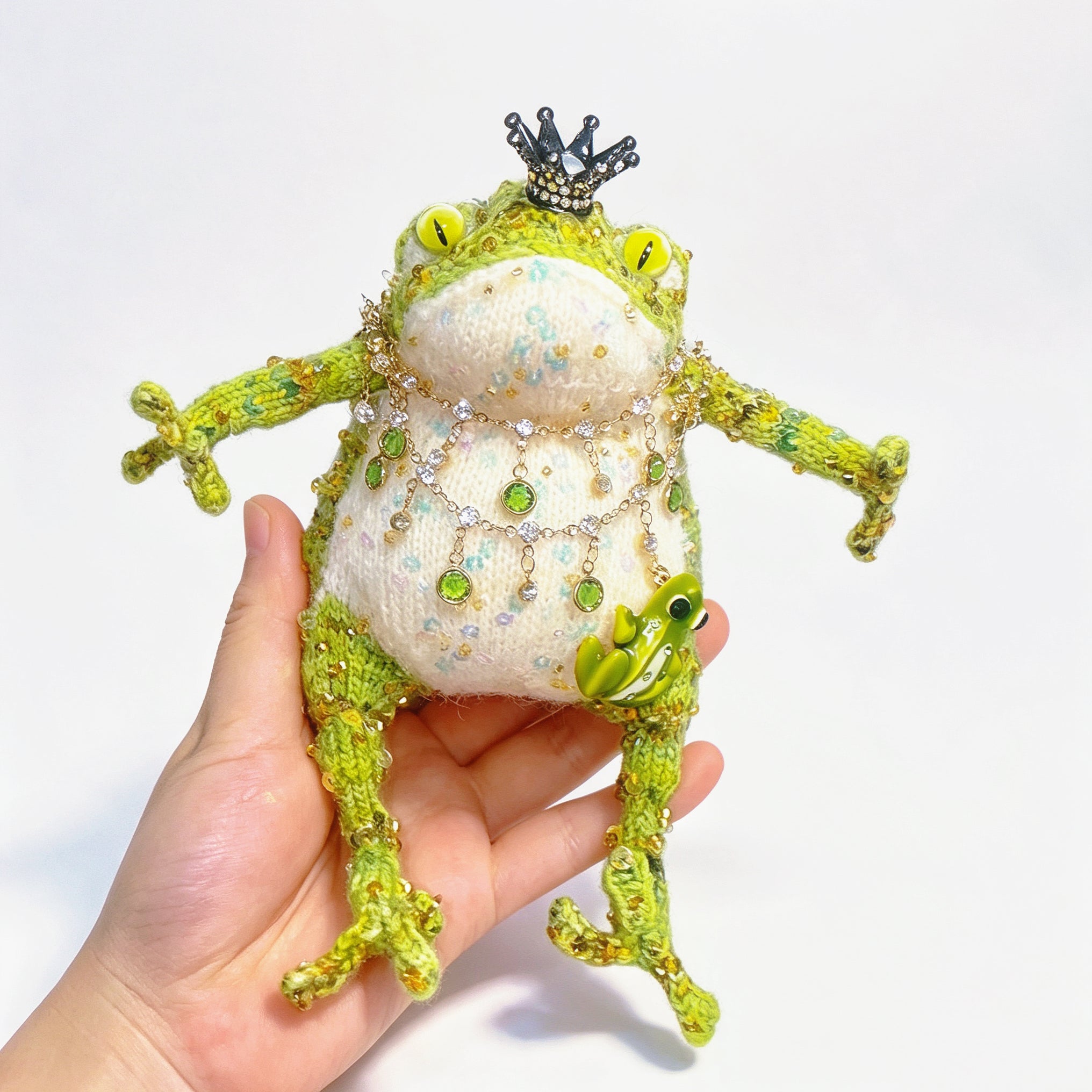 The Crowned Royal Lovers – Set of 2 Hand-Knitted Bejeweled Toads: Pink Princess with Crystal Crown, Star-Moon Charms &amp; Golden Fan, Green Prince with Black Crystal Crown, Gold Chains &amp; Tiny Frog Companion | The Third Space