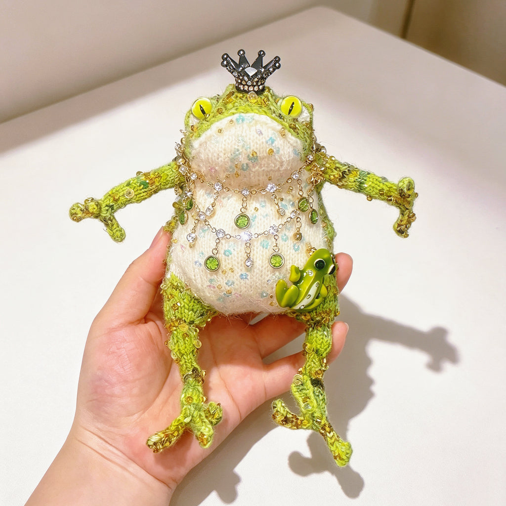 The Crowned Royal Lovers – Set of 2 Hand-Knitted Bejeweled Toads: Pink Princess with Crystal Crown, Star-Moon Charms &amp; Golden Fan, Green Prince with Black Crystal Crown, Gold Chains &amp; Tiny Frog Companion | The Third Space